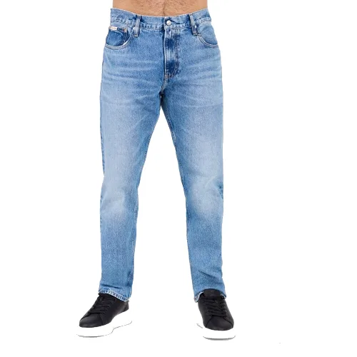 CALVIN KLEIN Błękitne męskie jeansy Slim Straight, Rozmiar 34/32