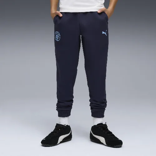 Młodzieżowe spodnie Manchester City FtblEssentials PUMA