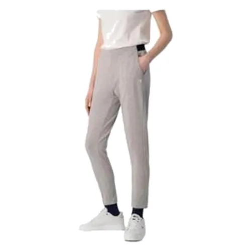 Spodnie sportowe damskie Champion 116097EM006